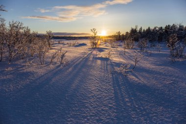 Nuorgam, Lapland, Finlandiya 'da kış günbatımı