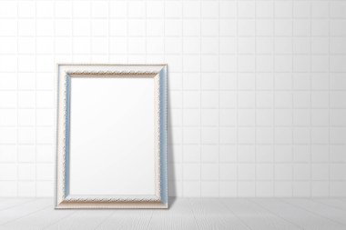 Beyaz seramik duvarda boş beyaz çerçeve. kopyalama alanı ile.