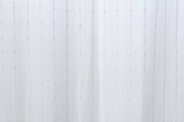 İnce beyaz perdeler ışığı filtreler. Duvar kağıdı için beyaz arkaplan.