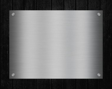  Siyah tahta arkaplanındaki metin için kopyalama alanı olan parlak metal tabela.       