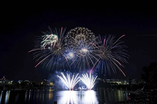 Fireworks set against a dark sky