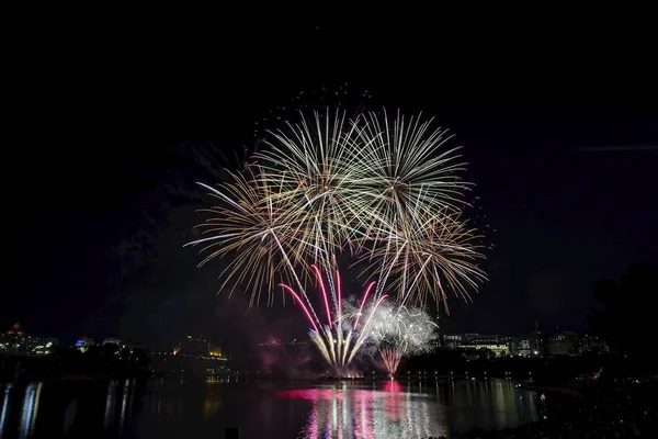 Fireworks set against a dark sky