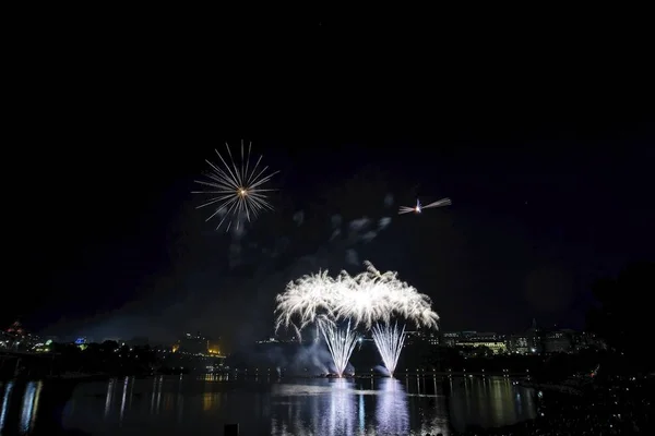 Fireworks set against a dark sky