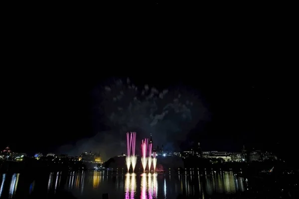 Fireworks set against a dark sky