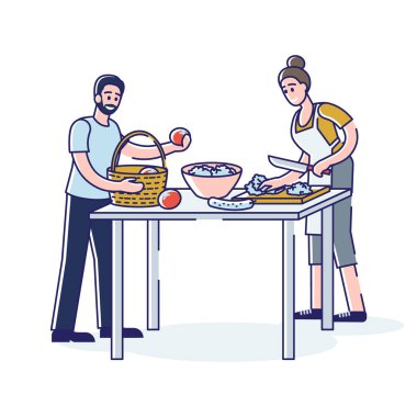 Kahvaltı için taze sebze salatası pişiren çift. Genç adam ve kadın vejetaryenler