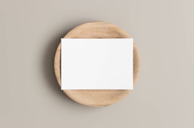 Invitation white card mockup on a wooden plate. 5x7 ratio, similar to A6, A5. clipart