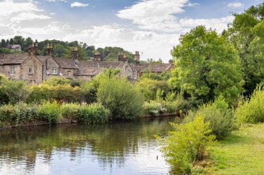 A view of the River Wye running through the market town of Bakewell in Derbyshire clipart