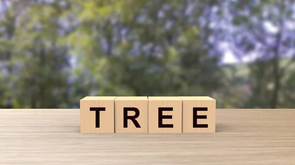 Baumwort Holzwürfel Auf Tisch Vertikal Über Verschwommenem Hintergrund Mit Waldbäumen — Stockfoto