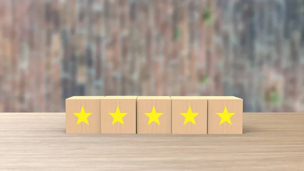 Wooden cube five yellow star review on blur wall of bricks. Service rating, satisfaction concept. reviews and comments google maps, tripadvisor, facebook. online evaluations.