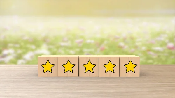 Wooden Cartoon Cube Five Yellow Star Review Blue Field Flowers — стоковое фото