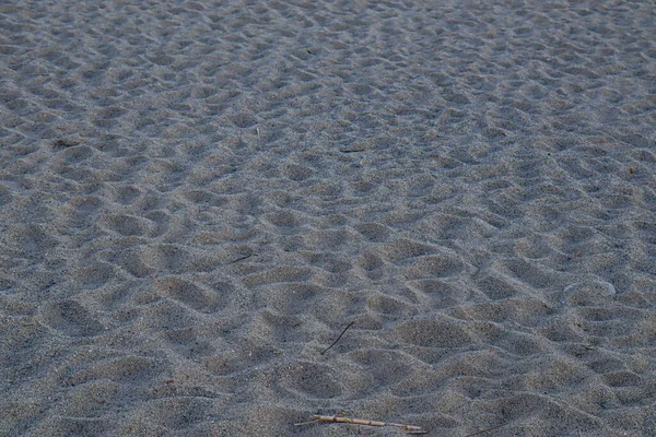 海边的鹅卵石 沙子上有人的脚印 意大利海滩Reggio Calabria — 图库照片