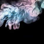 Abstrakt färgglad rök på svart bakgrund