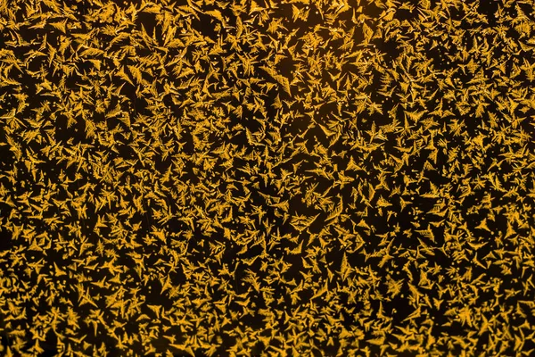Cam Üzerinde Altın Kar Tanesi Arka Plan — Stok fotoğraf
