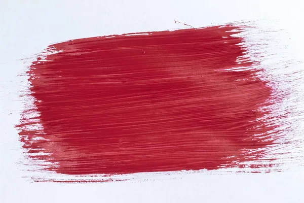 Оштукатуренный Лист Кисточкой Красной Краски — стоковое фото