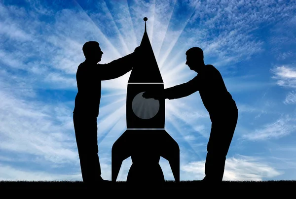 Silhouettes Two Men Collect Rocket Concept Start — Stock Photo, Image