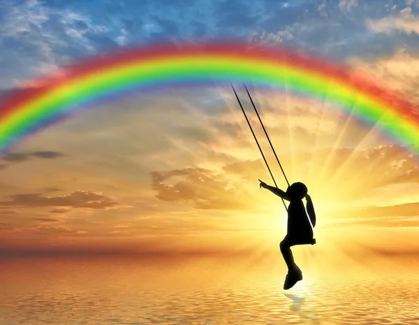 Silhouette Little Girl Child Swing Rainbow Sea Conceptual Image Happy — Stock Photo, Image