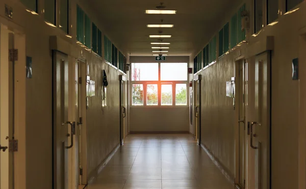 The corridor wallkway in the laboratory building. walk through survey for safety checking, can use as a background interior field or building part background. Area way can walking. has sunlight.