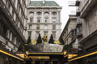 London, United Kingdom - January 1, 2017: Facade of the Savoy hotel with Christmas decoration in London, England, United Kingdom clipart