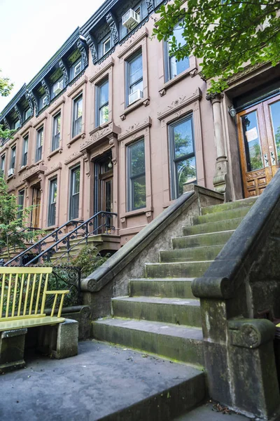 Old typical houses in the Brooklyn neighborhood in Manhattan, New York City, USA