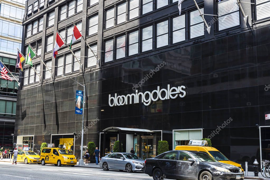 New York City, USA - July 31, 2018: Facade of the Bloomingdales department store with traffic and people around in Lexington Avenue; Manhattan, New York City, USA