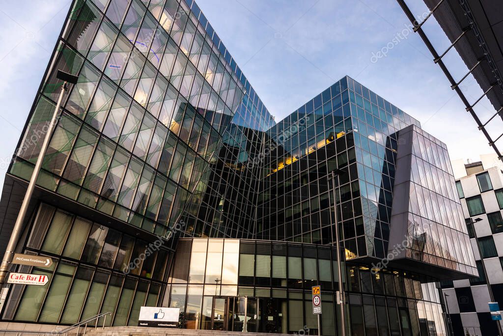 Dublin, Ireland - January 1, 2020: Logo of Facebook headquarters, office building in Grand Canal Square, Dublin, Ireland