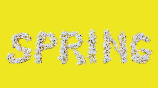 Inscription Spring Written White Flowers Lilac Yellow Background Word Spring — Stock Photo, Image