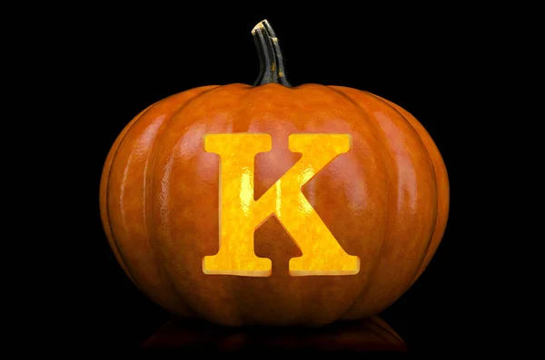 Glowing Letter K carved in pumpkin. Halloween font on black background, 3D rendering