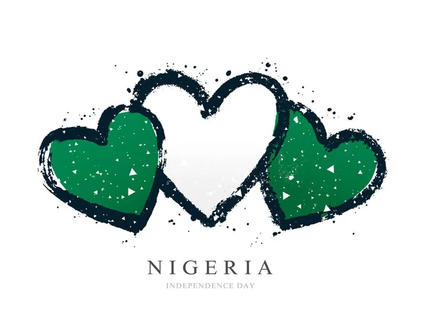 Nigeriansk flagga i form av tre hjärtan. — Stock vektor