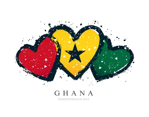 Ghana flagga i form av tre hjärtan. — Stock vektor