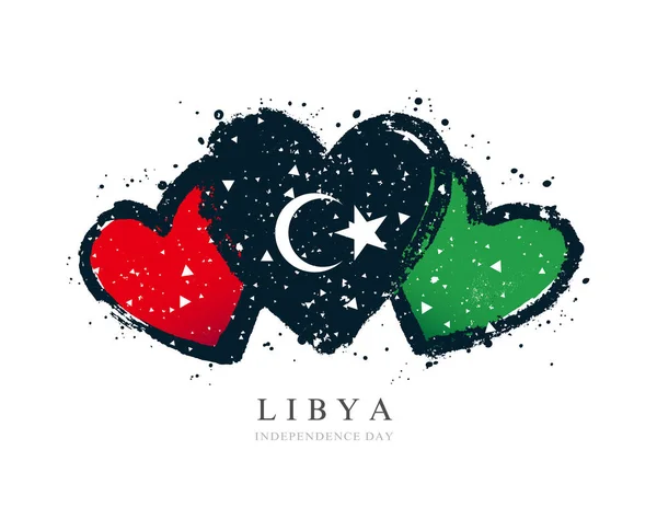 Bandiera libica sotto forma di tre cuori . — Vettoriale Stock