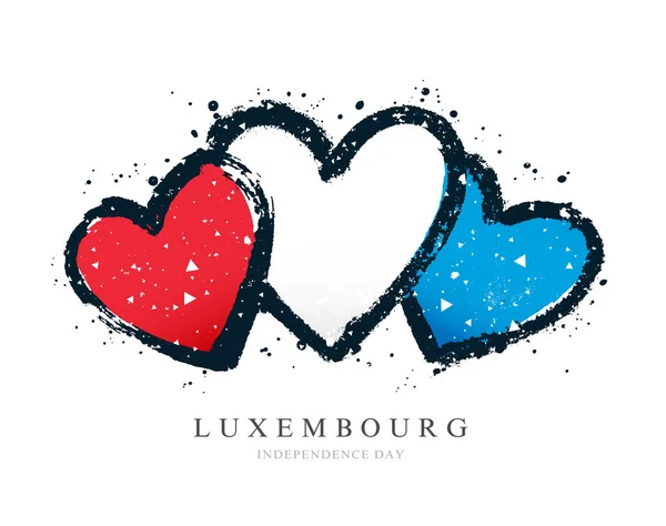 Luxembourg flag in the form of three hearts.