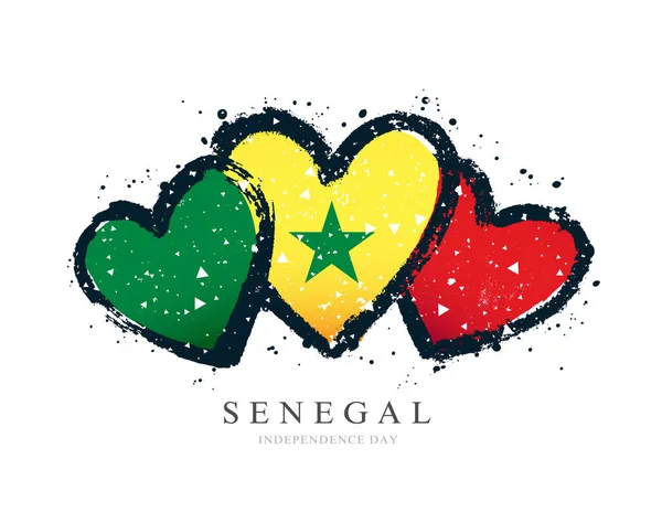 Drapeau sénégalais en forme de trois cœurs . — Image vectorielle