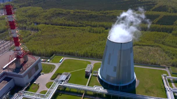Aerial view of cogeneration plant. Thermal power plant. Industrial heat supply for a big city. — Stock Footage Aerial View Cogeneration Plant Thermal Power Plant Industrial Heat Supply Stock Footage