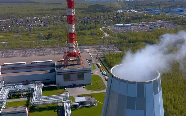 Industrial heat supply for a big city. Aerial view of a thermal power plant. Combined heat and power plant.