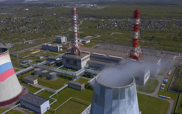 Industrial heat supply for a big city. Aerial view of a thermal power plant. Combined heat and power plant