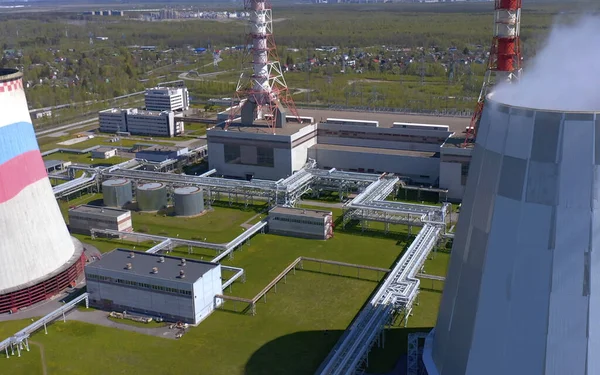 Industrial heat supply for a big city. Aerial view of a thermal power plant. Combined heat and power plant.