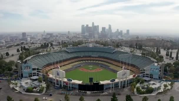 Aerial pull back, empty Los Angeles Dodgers Stadium, during Coronavirus, no fans — Stock Video