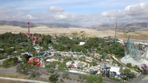 Six Flags Magic Mountain theme park in Valencia, Santa Clarita, aerial view Royalty Free Stock Footage