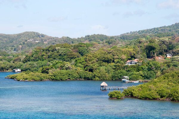 The scenic view of Roatan resort island lush tropical coastline (Honduras).