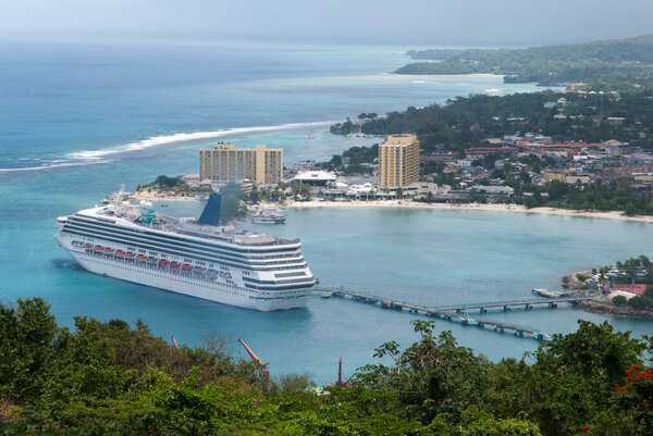 The aerial view of a cruise ship moored in Ocho Rios resort town bay (Jamaica).
