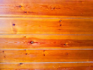 Yatay olarak maun kahverengi tahta çıtçıtlarının arkaplanı