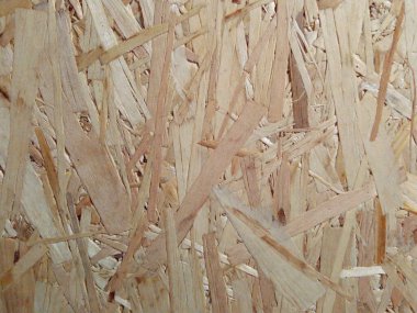 Geri dönüştürülmüş tahta parçasının deseni soyut bir makro fotoğraf olarak gösterilir.