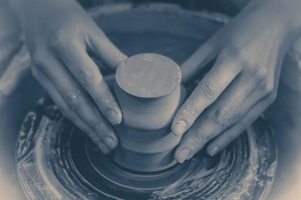 Photo in old vintage style. Creating ceramic products of white clay close-up. — Stock Photo, Image