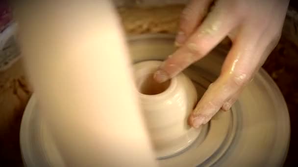 The sculptor in the workshop makes a jug out of earthenware closeup. — Stock Video