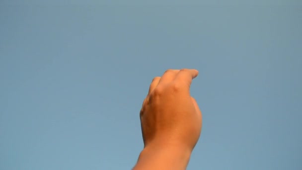 Hand movement in the air background blue sky — Stock Video