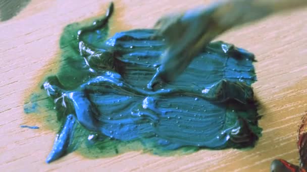 Pinceau de peinture bleu de tache de palette — Video