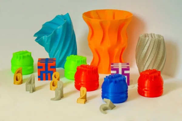 Models printed by 3d printer. Colorful objects printed 3d printer