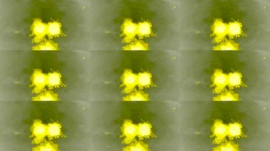 Gri ıslak pürüzsüz yüzeye güzel Yayilim beyaz yeşil mürekkep damlaları.