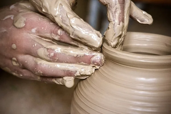 Hands in the clay macro — Stock Photo, Image