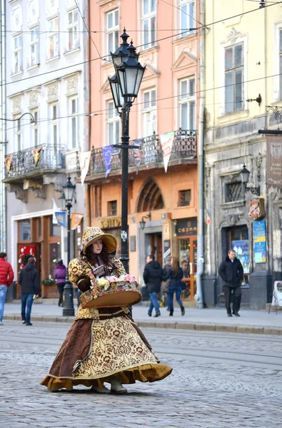 Woman in a suit lady on the street in the city of Lvov, Ukraine January 11, 2014 — Stock Photo, Image